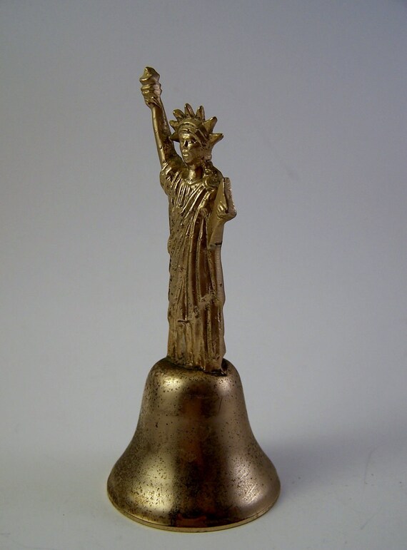 vintage brass statue of liberty bell