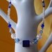 Necklace - Finland - blue clear glass crystal stretch -16 in. (pte-39)