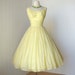 vintage 1950's dress ...pretty LEMON EYELET CHIFFON 4 layer full and fluffy skirt pin-up party prom dress with a bow