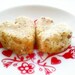 A reusable box of 9 raw mini cookies with coconut, vanilla and lemon. Vegan, organic, nut free & gluten free