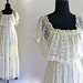 reserved / May 11 / 70s Ivory Lace Boho Hippie Ruffle Smocked Tiered Ethereal Wedding Gown Maxi Dress . XS . small . GT