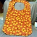 Senior Reversible Dining Bib, Orange Basketballs Print