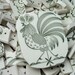 Hand cut mosaic tiles from Rooster plates