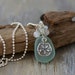 Aqua Sea Glass Pendant with Semi Precious Stones and Sand Dollar Charm