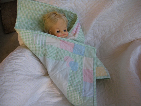 baby doll with blanket