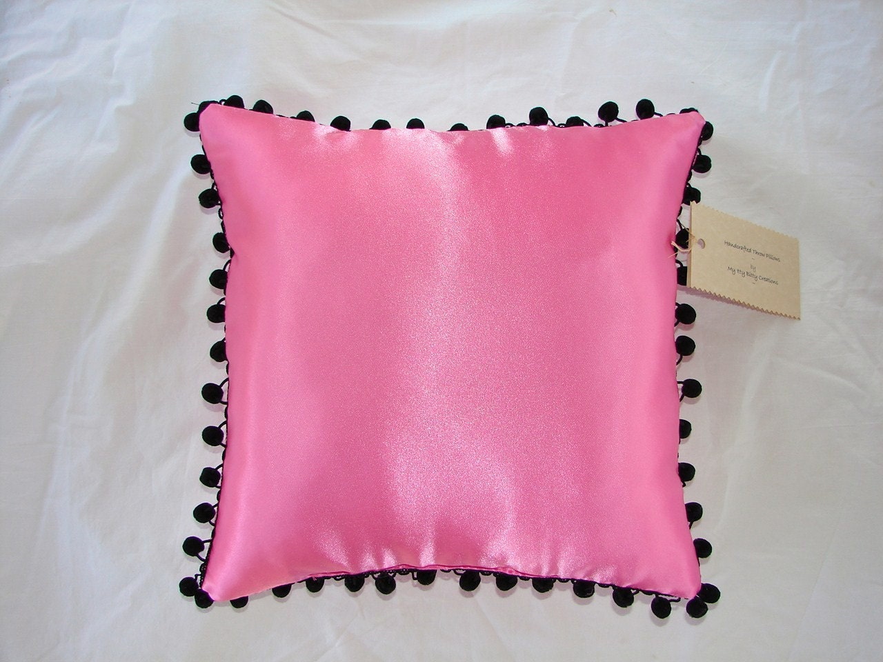 Satin Throw Pillow in Hot Pink with Black Ball Fringe