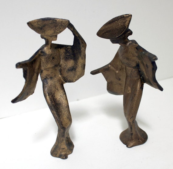 small cast iron figurines