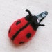 Ladybug hair clip - makes great stocking stuffer, needle felted in bright red and black from pure wool
