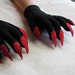 red gloves with claws