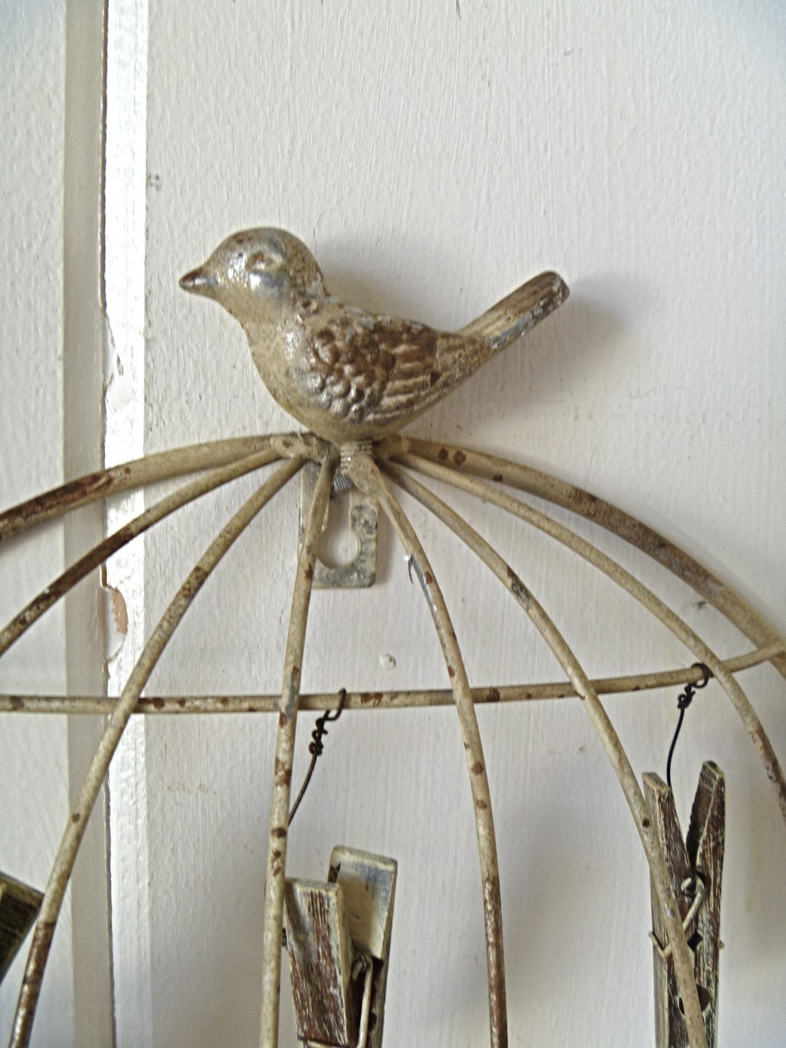 Chloe Bird Cage Wall Hanging with clothes pegs and wall