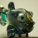 Valdez.................. lampwork fish bead............. sra.......