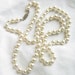 Vintage White Glass Faux Pearl Long Necklace with a Silver Clasp