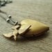 Heart Locket and Bird Necklace - Brass Charm Pendant on Oxidized Sterling Silver Chain