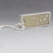 That Feeling necklace in pale yellow resin and sterling silver, dots