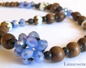 Periwinkle Crystal Woven Cluster Wood Beaded Matinee Length Necklace Periwinkle Crystal Woven Cluster Wood Beaded Matinee Length Necklace