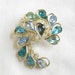 Vintage Shades of Blue and Clear Rhinestones Swirling Pin or Brooch