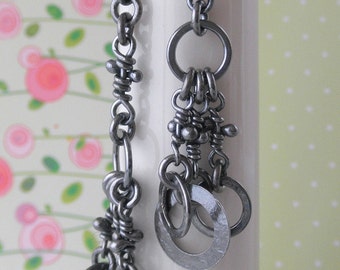 Gaia Earrings Sterling Silver Only. Rustic Oxidized Knots