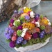 Handmade colorful dried flowers centerpiece in birch bark covered heart vase. A lovely Valentine's day gift.
