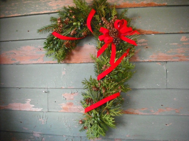 Fresh Evergreen candy cane wreath, made with Balsam, Pine, Boxwood and Cedar.