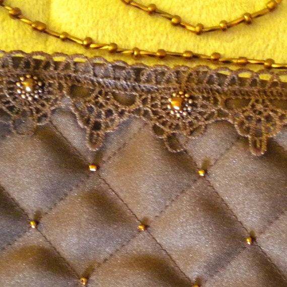 brown quilted handbag