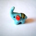 Little Light Blue Ceramic Elephant: mini animal, ceramic animal, tiny animal, small animal, little animal, decoration, small, little, mini