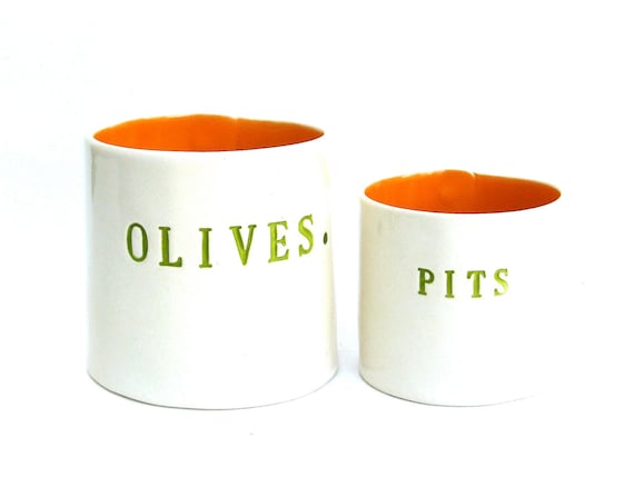 olives and pits  ....  hand built porcelain containers ...  vessels