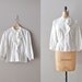 1950s blouse / eyelet 50s blouse / ruffle ascot