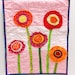 poppy quilt- wall art quilt- 5 stems in red, orange, yellow and pink