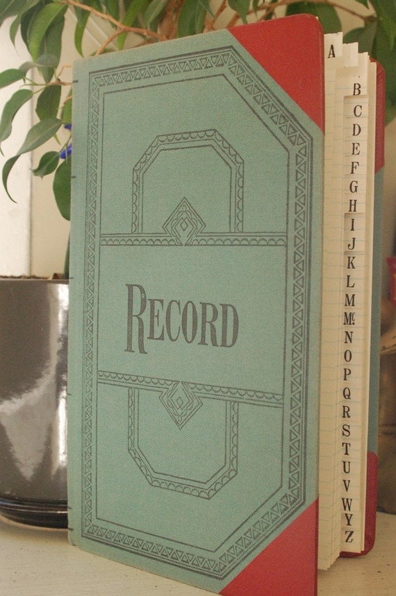 blank record book with alphabet tabs