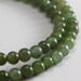 Nephrite Jade Beads 4mm round beads - 8 inch strand