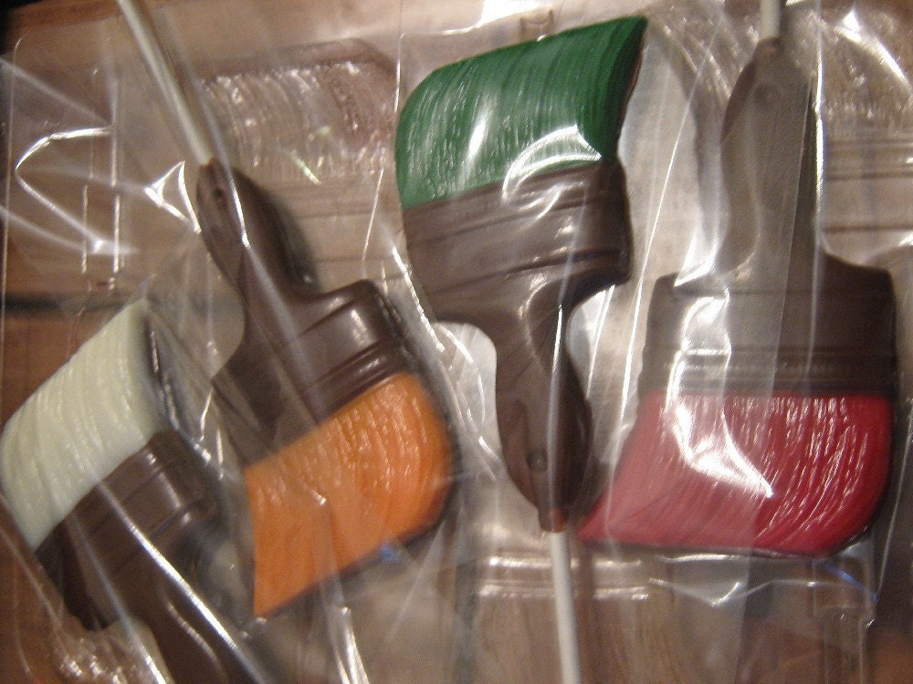One dozen paintbrush lollipops