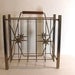 Vintage gold metal wire mid century magazine rack with starburst design