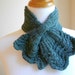Knitted scarflette. Neckwarmer