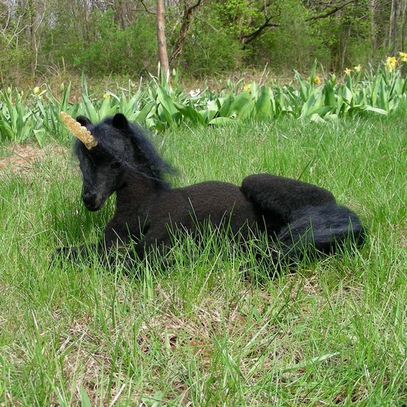 black stuffed unicorn