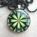 Kaleidoscope Flower- Green and Black- Round Glass Pendant with Black Ball Chain