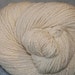 Merino (Rambouillet) Sport weight mill spun yarn. Soft 'green spun'.
