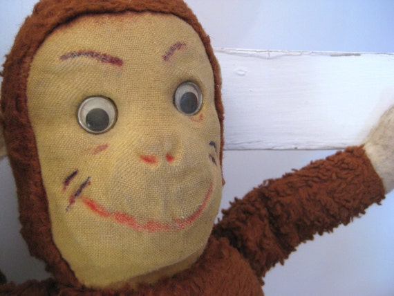 stuffed red monkey