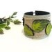 Leather bracelet with green leather leaves