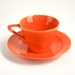 Vintage Fiesta Harlequin Teacup and Saucer in Red / Orange