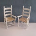 Chairs, carver, with arms, two with mock yarn "rush" seats,. a dollhouse mini