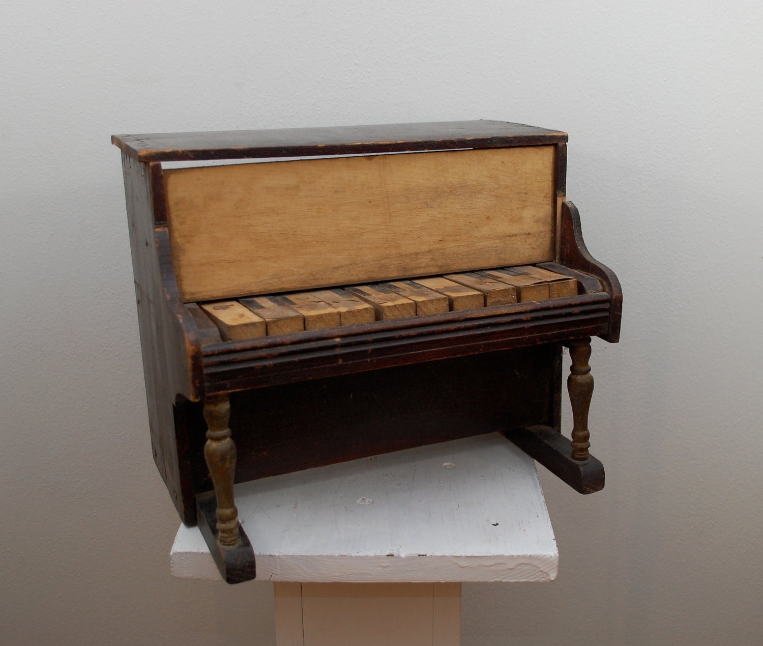 vintage wooden toy piano