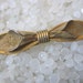 Beautiful etched gold tone bow vintage barrette