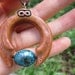 Cradled in the Arms of Etrnity Handcarved Wooden Necklace with Turquoise