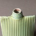 Porcelain ribbed oval flask bottle vase in blue-green
