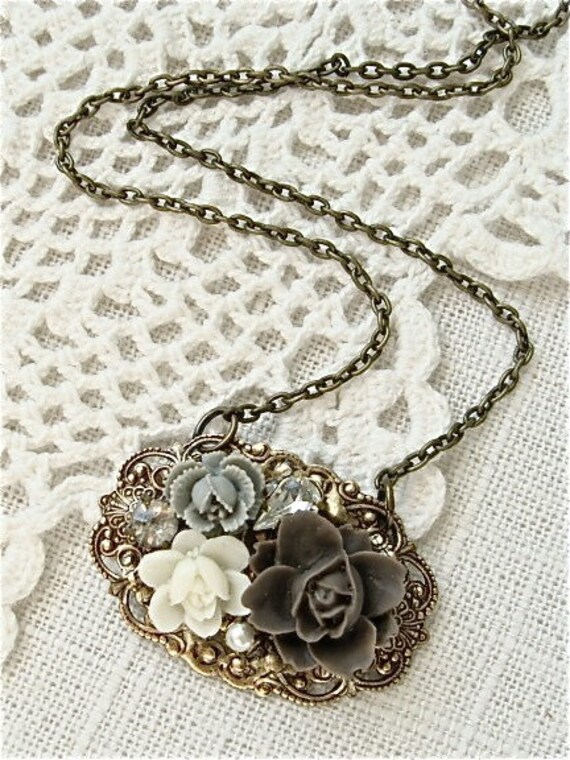Vintage style flower cluster necklace. Antique brass.