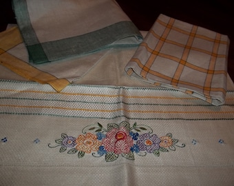 Never used four linen vintage towels