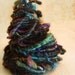 Hand spun yarn Coil Bulky corespun hebridean amble Art Yarn 32yards
