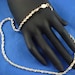 Silver Rhodium Plated Torsade (Twisted Rope) Necklace by NAPIER
