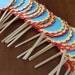SALE - Yellow, Blue, and Red scalloped cupcake toppers (24)