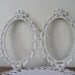 Ornate Pair of Italian Oval Metal Frames in Cottage White